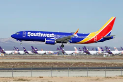 In this March 23, 2019, file photo, a Southwest Boeing 737 Max lands at the Southern California Logistics Airport in Victorville, Calif.