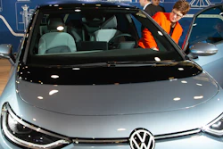 CDU party chairwoman Annegret Kramp-Karrenbauer takes a seat in an electric ID.3 car displayed by Volkswagen at the CDU convention in Leipzig, Nov. 23, 2019.
