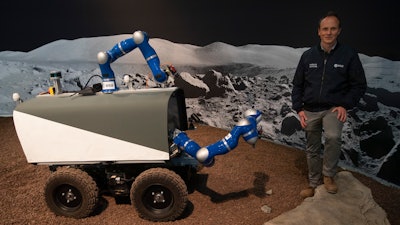 Kjetil Wormnes, automation and robotics system engineer, poses with the Space Rover after a training exercise of the European Space Agency in Katwijk, Netherlands, Nov. 25, 2019.