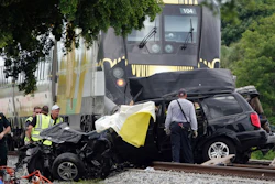 In this Aug 25, 2019, file photo, Broward Sheriff's Deputies and Pompano Beach Fire Rescue work the scene of a fatal accident on North Dixie Highway in Pompano Beach, Fla.