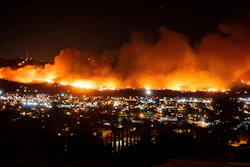 In this Oct. 31, 2019, file photo, smoke from the Maria Fire billows above Santa Paula, Calif.