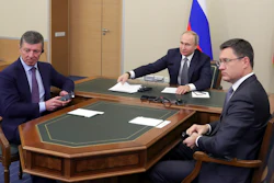 Russian President Vladimir Putin, center, Deputy Prime Minister Dmitry Kozak, left, and Energy Minister Alexander Novak attend a joint video conference with Chinese President Xi Jinping in the Bocharov Ruchei residence, Sochi, Russia, Dec. 2, 2019.