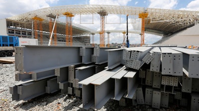 In this Dec. 8, 2013, file photo, steel beams sit outside Arena de Sao Paulo in Sao Paulo, Brazil.