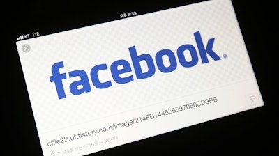 In this March 21, 2018, file photo, the Facebook logo is seen on a smartphone in Ilsan, South Korea.