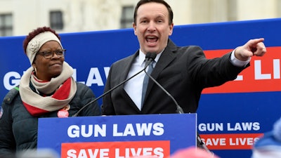 Sen. Chris Murphy, D-Conn., speaks at a protest outside the Supreme Court in Washington, Dec. 2, 2019.