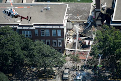 In this Aug. 2, 2017, file photo, emergency workers respond to an explosion at Minnehaha Academy in Minneapolis.