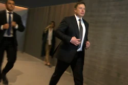 In this frame grab from video, Tesla CEO Elon Musk leaves court, Tuesday, Dec. 3, 2019, in Los Angeles.