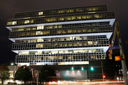 In this Sept. 12, 2019, file photo, cars pass Purdue Pharma headquarters in Stamford, Conn.