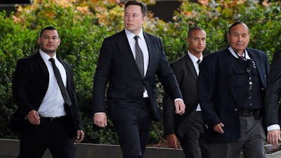 Tesla CEO Elon Musk arrives at U.S. District Court, Dec. 4, 2019, in Los Angeles.