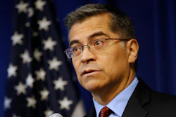 California Attorney General Xavier Becerra discusses settlements reached with 52 automobile parts manufacturers for illegal bid rigging during a news conference, Dec. 4, 2019, in Sacramento.