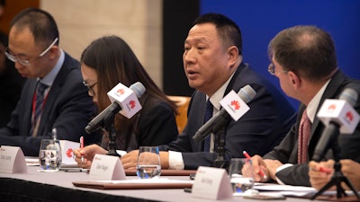 Song Liuping, chief legal officer of Huawei, speaks during a press conference at Huawei's campus in Shenzhen, Dec. 5, 2019.