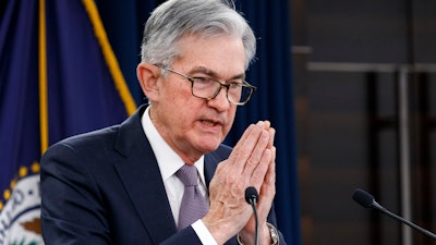 Federal Reserve Chair Jerome Powell gestures while speaking during a news conference after the Federal Open Market Committee meeting, Dec. 11, 2019, in Washington.