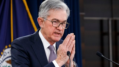 Federal Reserve Chair Jerome Powell gestures while speaking during a news conference after the Federal Open Market Committee meeting, Dec. 11, 2019, in Washington.
