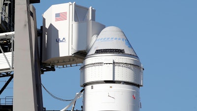 A Boeing Starliner spacecraft sits on a United Launch Alliance Atlas 5 rocket at the Cape Canaveral Air Force Station, Dec. 4, 2019.