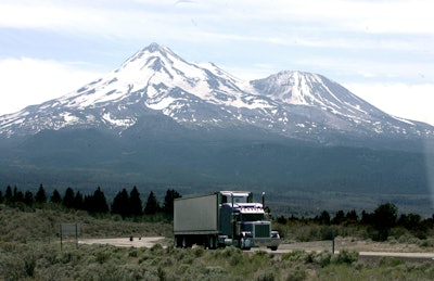 In this June 19, 2008, file photo, a truck drives past Mt. Shasta, near Weed, Calif.