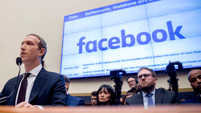 This Oct. 23, 2019, file photo shows Facebook CEO Mark Zuckerberg testifying before a House Financial Services Committee hearing on Capitol Hill.