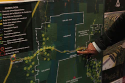 In this March 18, 2019, file photo, Rogelio Jiménez Pons, director of Fonatur, points to a map of a planned train line through the Yucatan Peninsula.