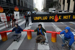 Protesters block traffic on Beale Street at a Pacific Gas & Electric building, San Francisco, Dec. 16, 2019.