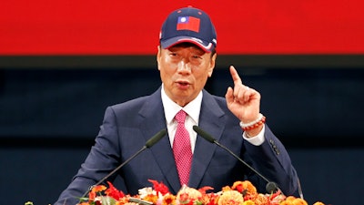 In this Feb. 2, 2019, file photo, Chairman of Hon Hai Precision Industry Co. Ltd. Terry Gou delivers a speech during the company's annual carnival for employees in Taipei.