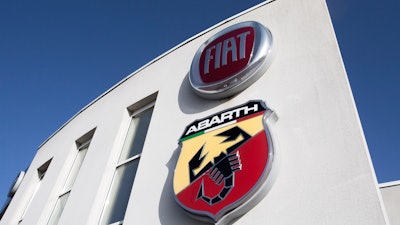 In this Nov. 2, 2019, file photo, the logo of Italian automaker Fiat is pictured in Villeneuve d'Ascq, France.