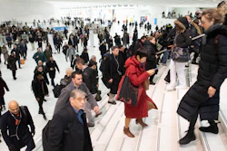 In this Dec. 4, 2019, file photo, commuters pass through the World Trade Center in New York.