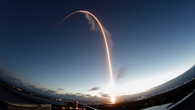 A time exposure of the United Launch Alliance Atlas V rocket lifting off from Cape Canaveral Air Force station, Dec. 20, 2019.