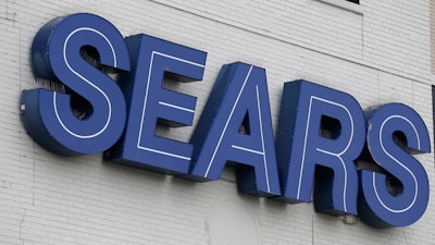 In this Oct. 15, 2018, file photo, a Sears sign is seen in Hackensack, N.J.