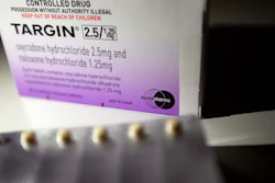 In this July 17, 2019, file photo, a pack of Targin opioid pills made by Mundipharma is photographed in Sydney.