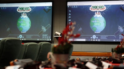 Monitors in the NORAD Tracks Santa center at Peterson Air Force Base, Dec. 23, 2019, in Colorado Springs, Colo.