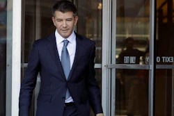 In this Feb. 7, 2018, file photo, former Uber CEO Travis Kalanick leaves federal court in San Francisco.