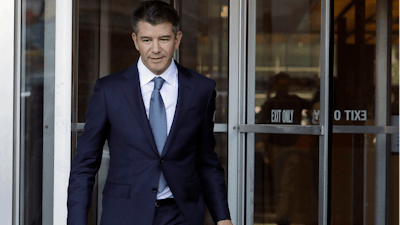 In this Feb. 7, 2018, file photo, former Uber CEO Travis Kalanick leaves federal court in San Francisco.