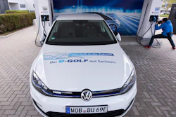 e-Golf car at a charging station during a press tour of the Volkswagen plant in Zwickau, May 14, 2019.