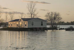 In this Oct. 22, 2019 photo, a home is surrounded by floodwaters in Bartlett, Iowa.