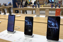 A selection of iPhones displayed an Apple store, Jan. 28, 2020, in suburban Boston.