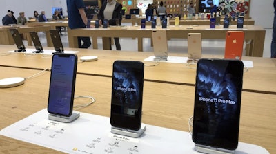 A selection of iPhones displayed an Apple store, Jan. 28, 2020, in suburban Boston.