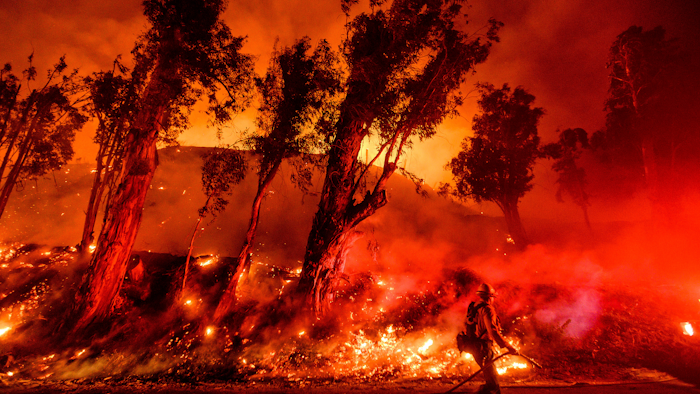 This Nov. 1, 2019, file photo shows flames from a backfire on a hillside as firefighters battle the Maria Fire in Santa Paula, Calif.