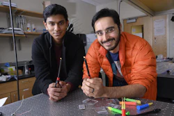 Georgia Tech undergraduate Gaurav Byagathvalli and assistant professor Saad Bhamla with examples of butane lighters they used to create the ElectroPen.