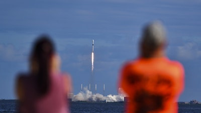 Julie and Doc Todd watch a SpaceX launch from KARS Park in Florida, Nov. 11, 2019.