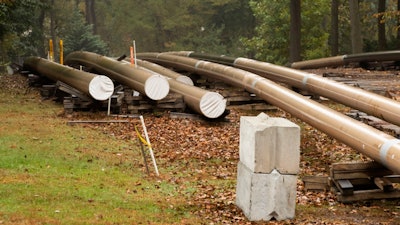 In this Oct. 22, 2019, file photo, pipes lay along a construction site on the Mariner East pipeline in a residential neighborhood in Exton, Pa.