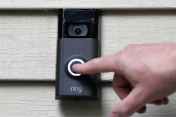 In this July 16, 2019, file photo, Ernie Field pushes the doorbell on his Ring doorbell camera at his home in Wolcott, Conn.