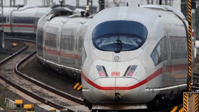 In this June 19, 2019, file photo, an ICE train approaches the main train station in Frankfurt, Germany.