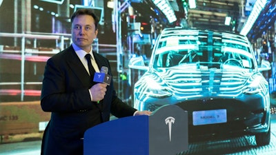 Tesla CEO Elon Musk speaks at a delivery ceremony for the first Model 3 cars made at Tesla's factory in Shanghai, Jan. 7, 2020.