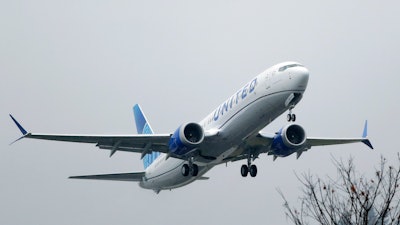 In this Dec. 11, 2019, file photo, a United Airlines Boeing 737 Max airplane takes off at Renton Municipal Airport in Renton, Wash.