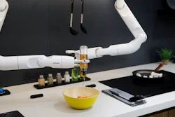 The Bot Chef pours dressing into a salad during a demonstration at the Samsung booth during the CES tech show, Jan. 7, 2020, in Las Vegas.