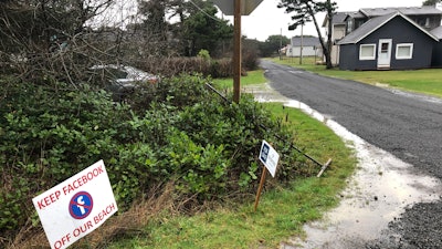 A sign expressing opposition to Facebook's submarine cable proposal, Tierra del Mar, Ore., Jan. 8, 2020.