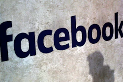 This Jan. 17, 2017, file photo shows a Facebook logo at Station F in Paris.