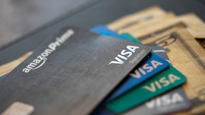 This Aug. 11, 2019, file photo shows credit cards in New Orleans.