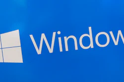This Aug. 7, 2017, file photo shows a Microsoft Widows sign on display at a store in Hialeah, Fla.