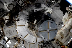 In this image taken from NASA video, NASA astronaut Jessica Meir works to finish upgrading the International Space Station's power grid, Jan. 15, 2020.