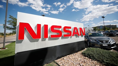 This Aug. 25, 2019, file photo shows a sign at a Nissan dealership in Highlands Ranch, Colo.
